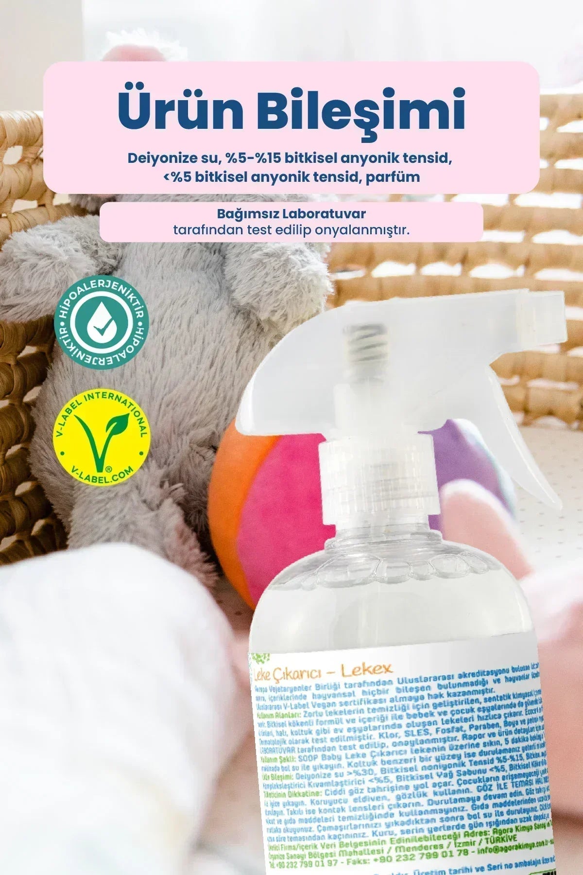 Bebek ve çocuk eşyaları için bitkisel leke çıkarıcı sprey şişesi ve sepet içinde oyuncaklar