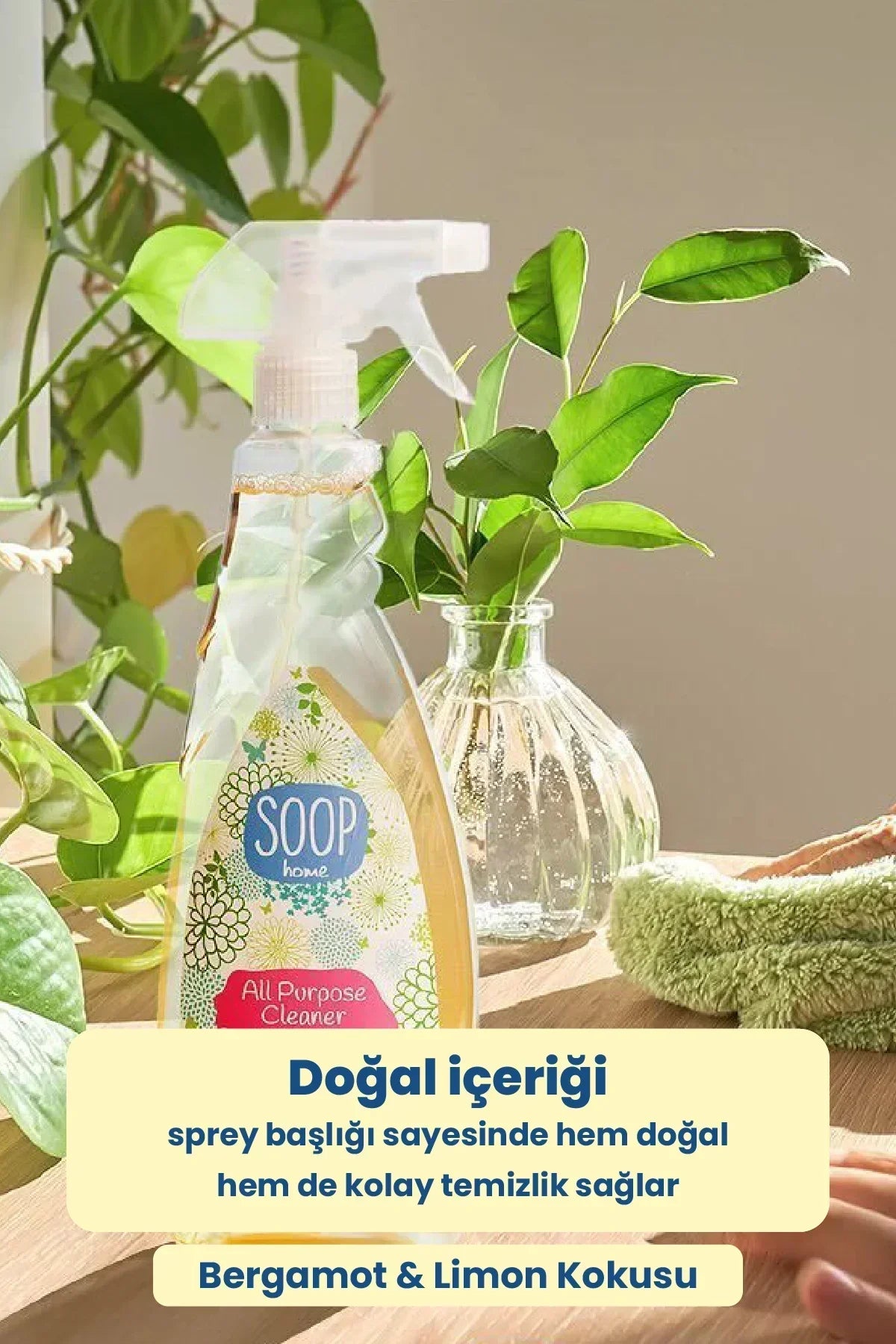 Bergamot ve limon kokulu Soop Home doğal içerikli çok amaçlı sprey temizleyici, yeşil yapraklı bitkilerle masa üstünde